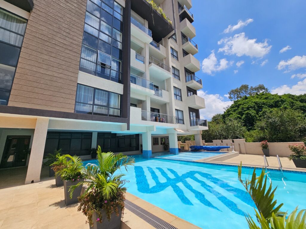 Contemporary high-rise facade of Synina Residency luxury apartments in Kileleshwa, Nairobi.