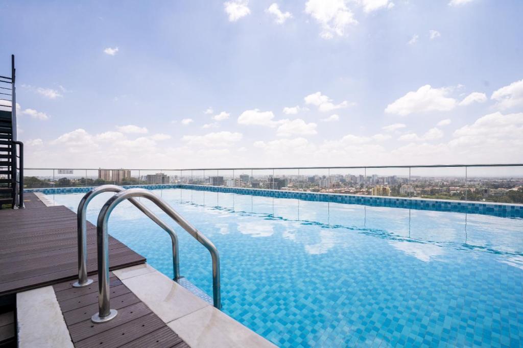 Rooftop swimming pool at Laurel Hills Upper Hill with city views.