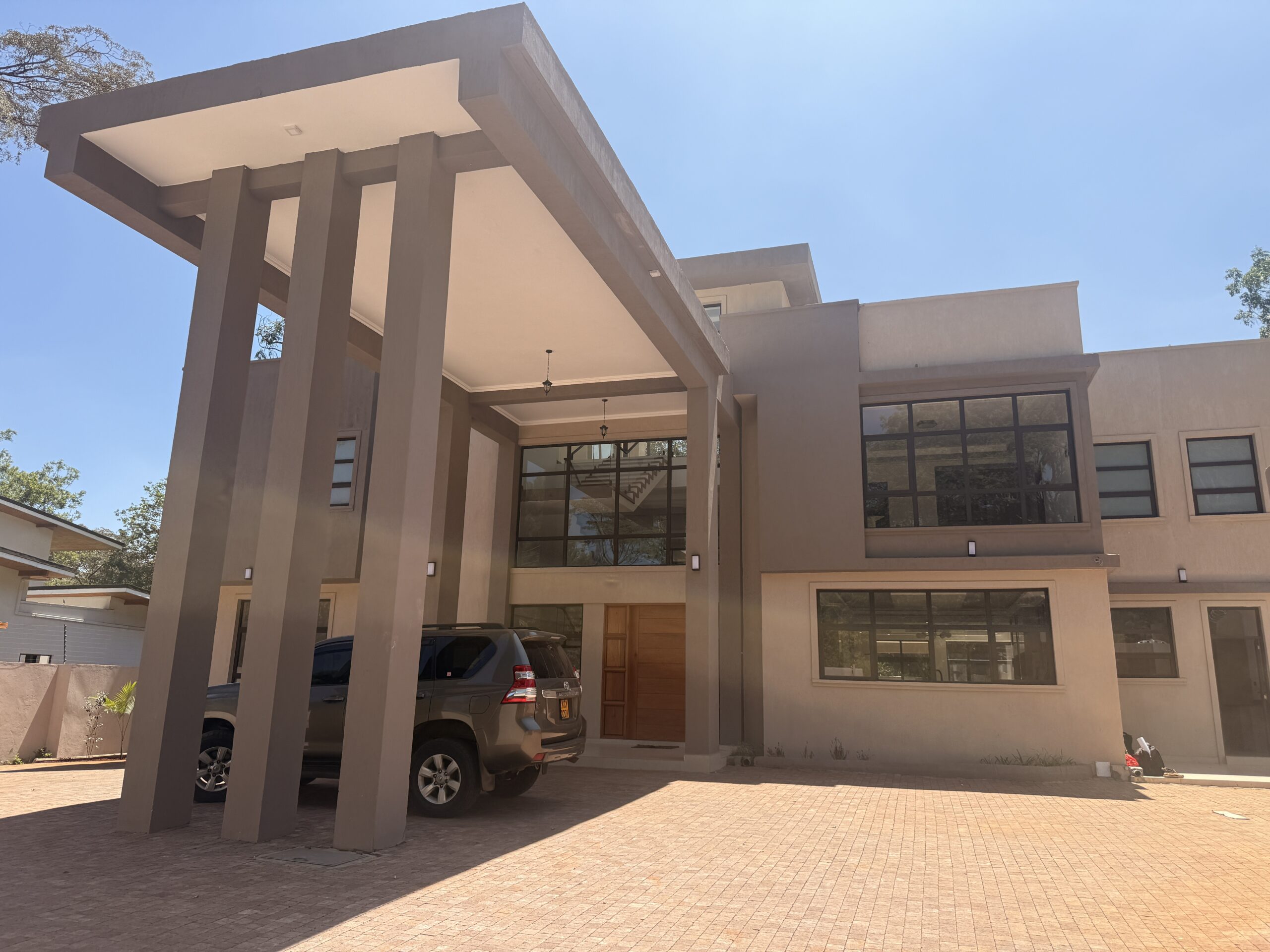 facial view of luxury 5 bedroom standalone home on half acre in Karen Windy Ridge.