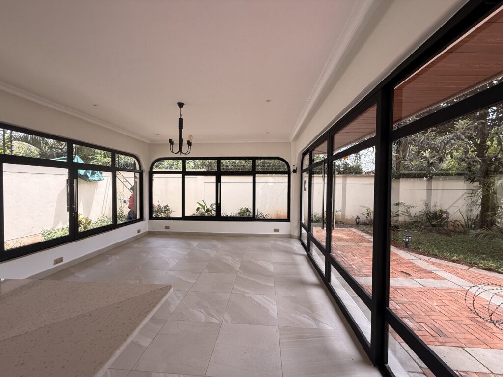 Manicured garden with entertainment gazebo in a Runda executive home
