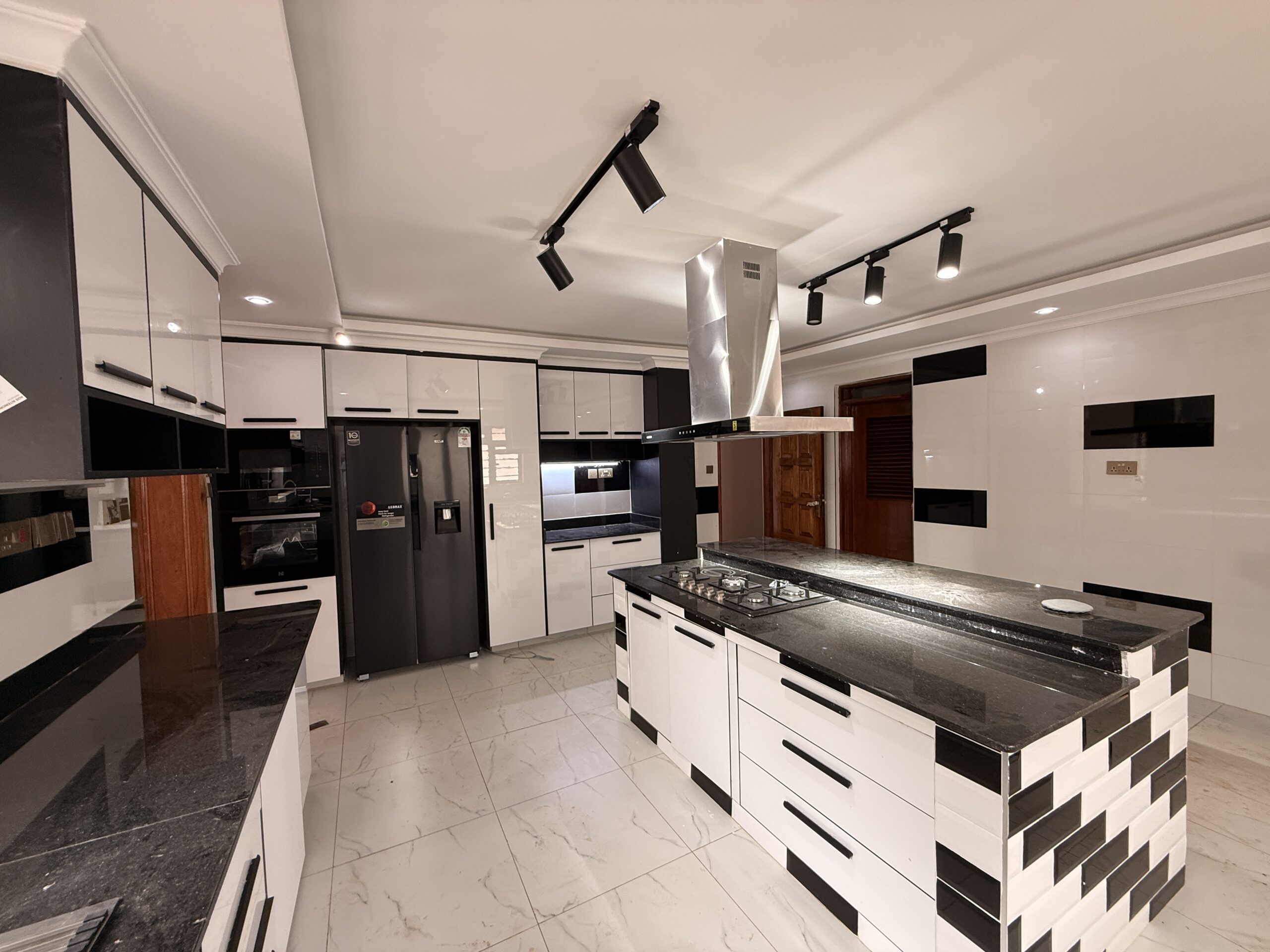 Fully fitted modern kitchen with high-end appliances