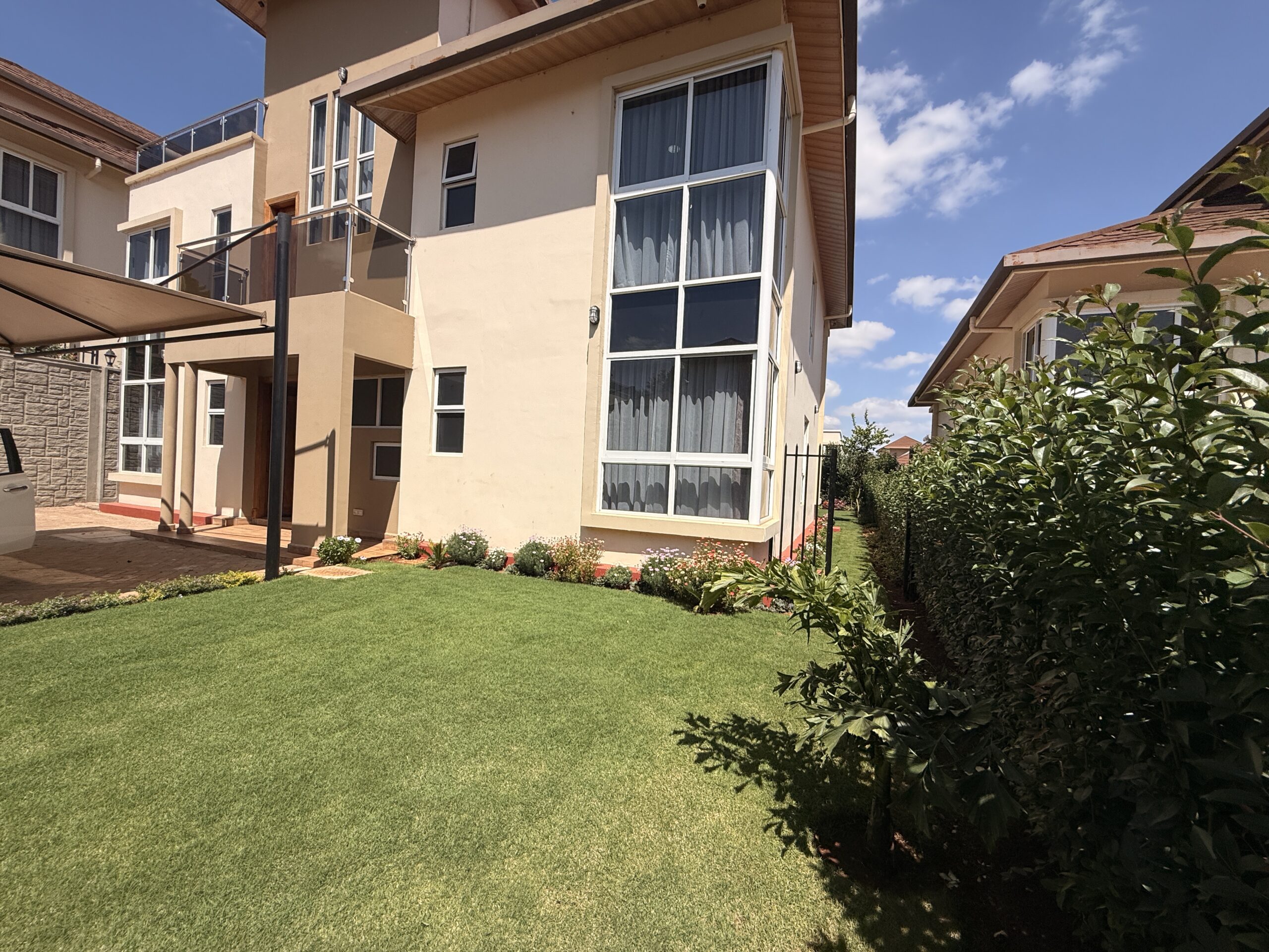 Exterior of a 4-bedroom luxury townhouse for sale at Iguta Paradise Runda.