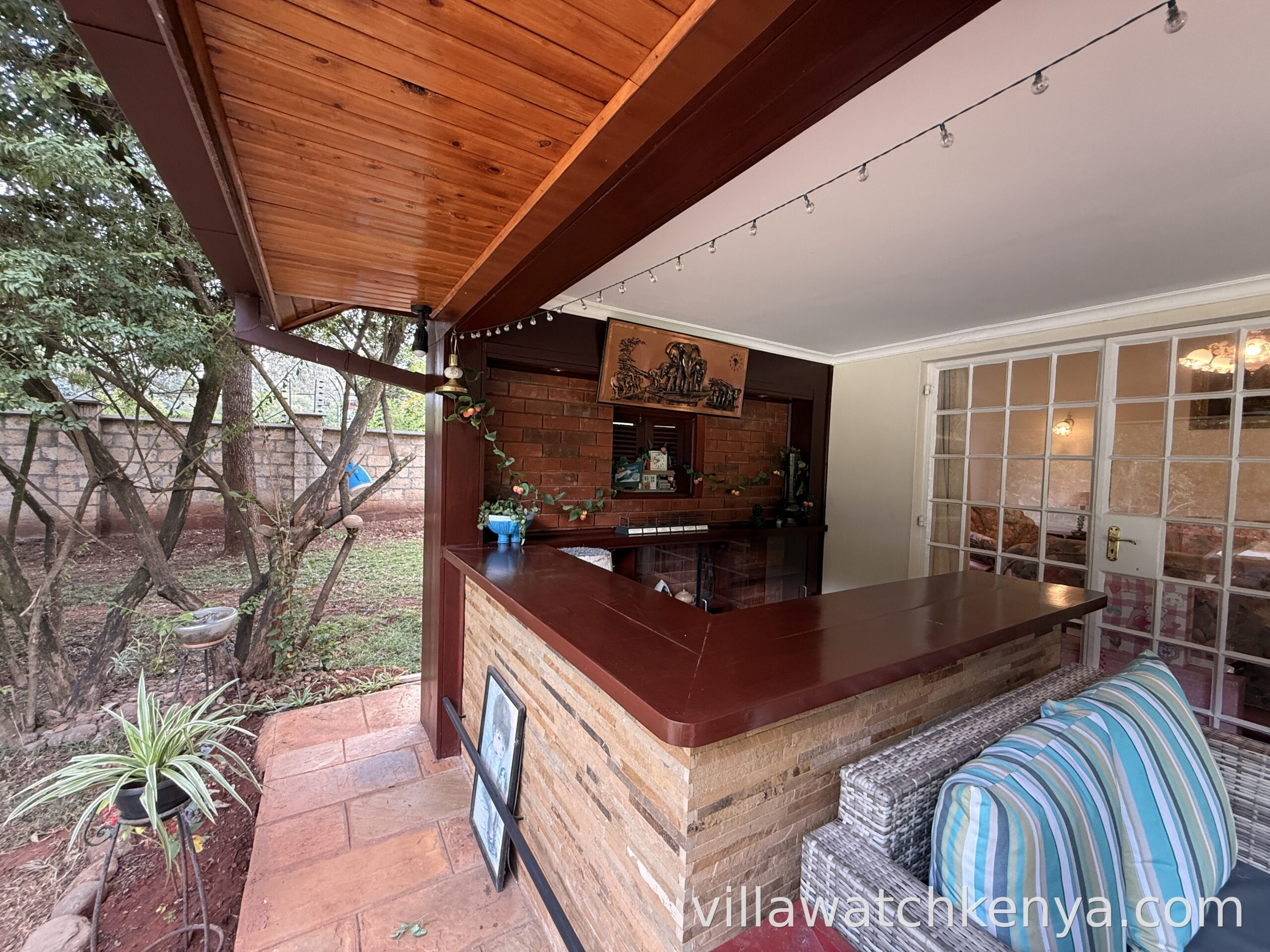 Outdoor patio and seating area on 1-acre plot of 5-bedroom home in Karen