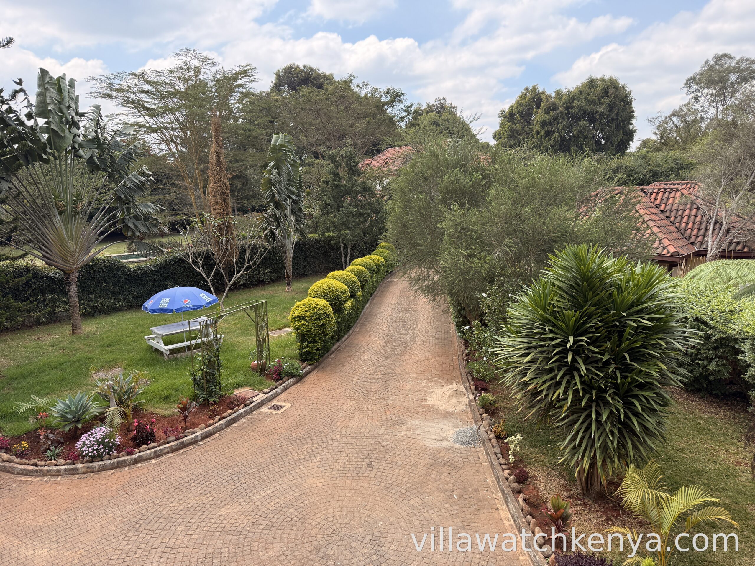 Secure driveway and entrance to 5-bedroom house with 2BR DSQ in Karen